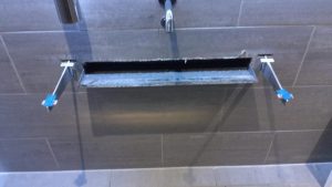 process of cleaning commercial sink